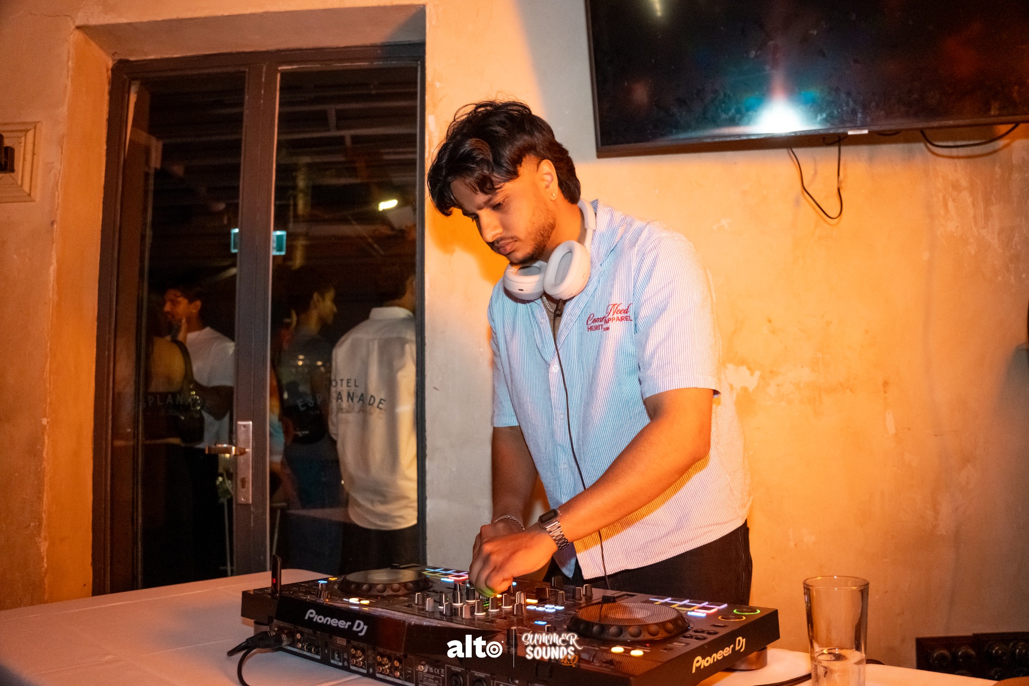 YUVI working the decks at a venue