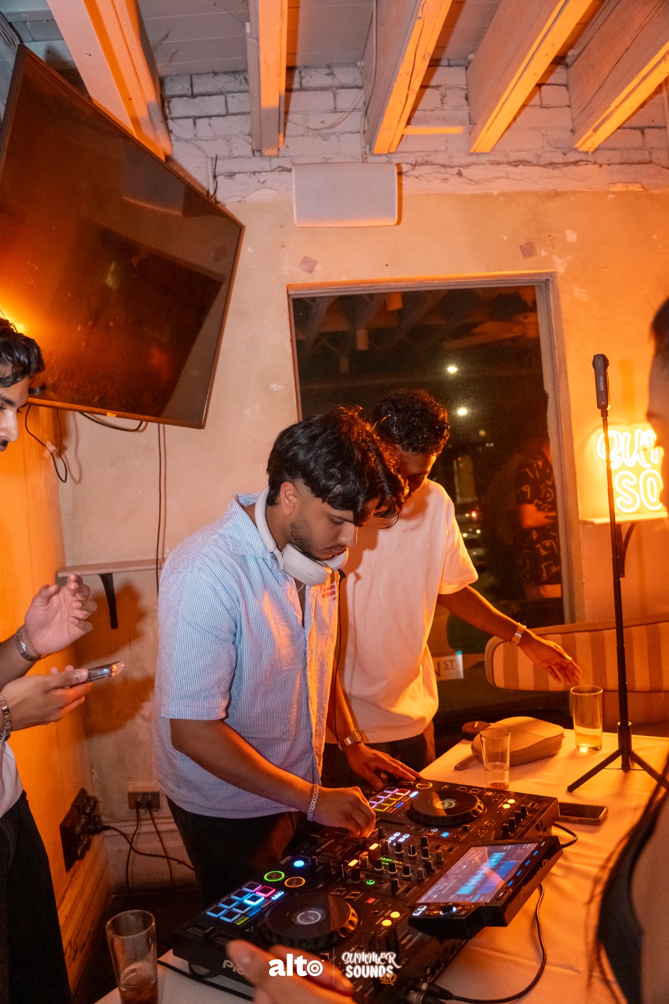 YUVI performing with the crowd nearby